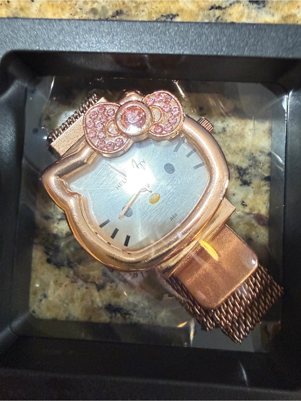 Hello Kitty Rose Gold Tone Mesh Watch with Crystal Bow Accent